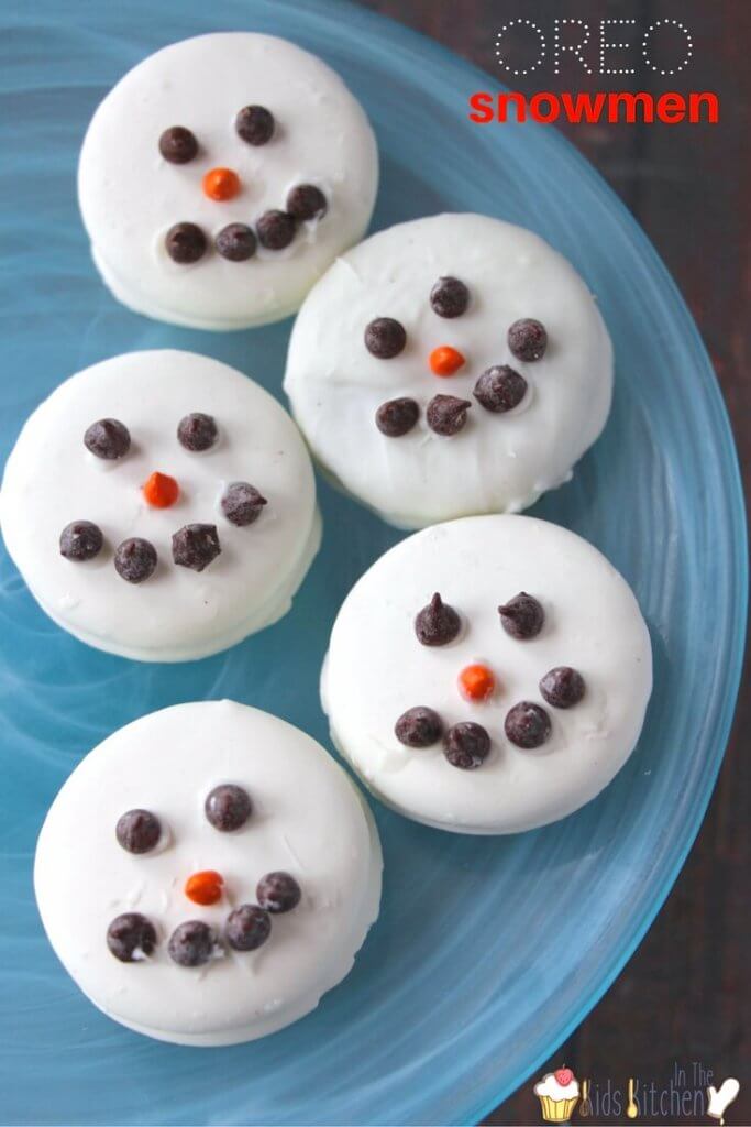 Simply adorable OREO Snowmen! An easy and fun kids dessert recipe perfect for winter and holiday parties or a FROZEN -themed birthday.
