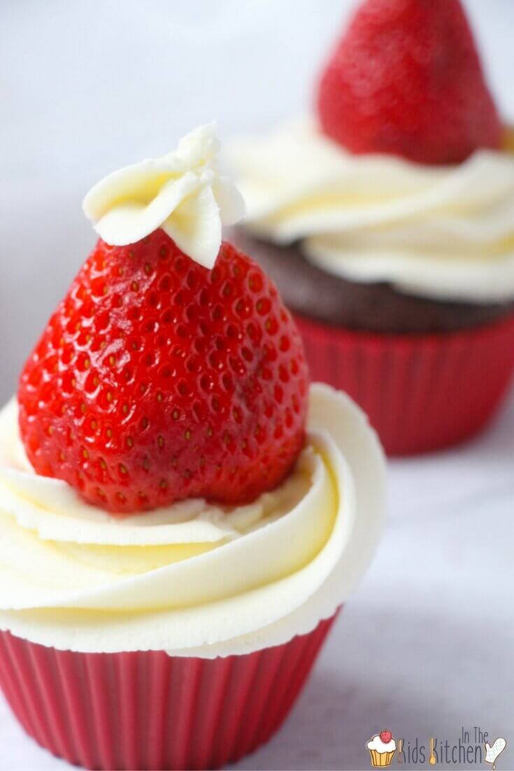 Gorgeous Strawberry cupcakes make a festive kids holiday treat! Perfect for Valentine's Day or Christmas!