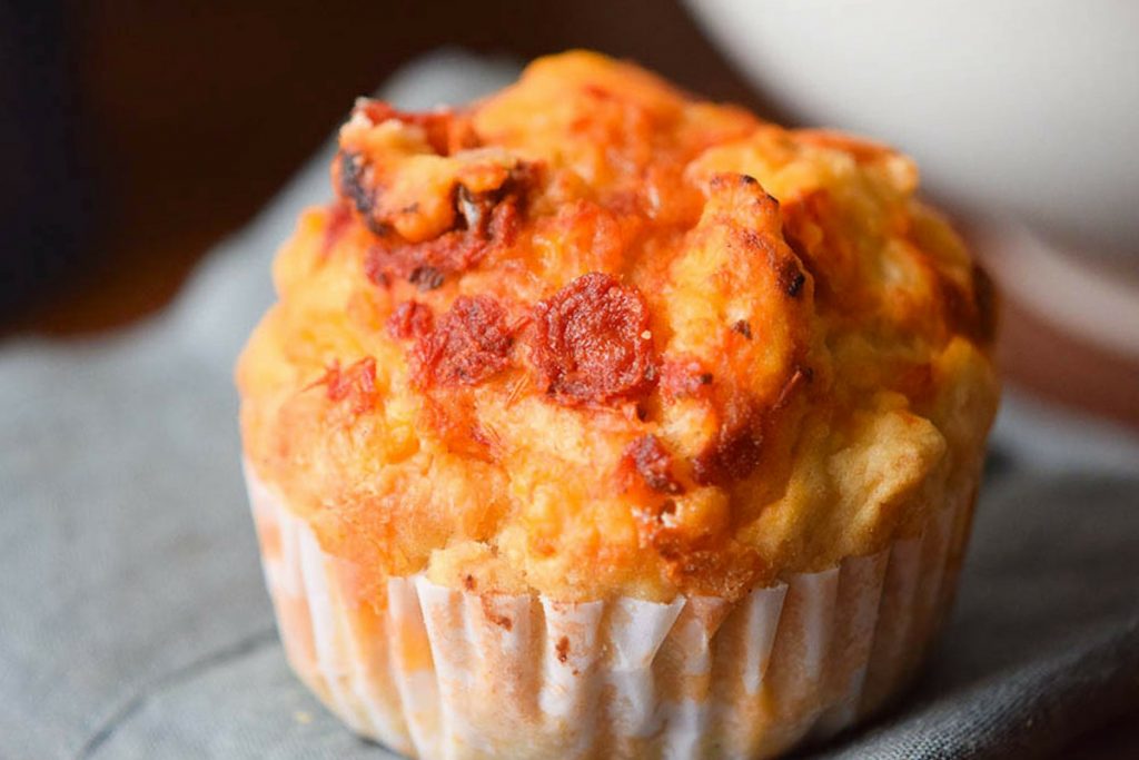 close up of a savory pepperoni and cheese muffin