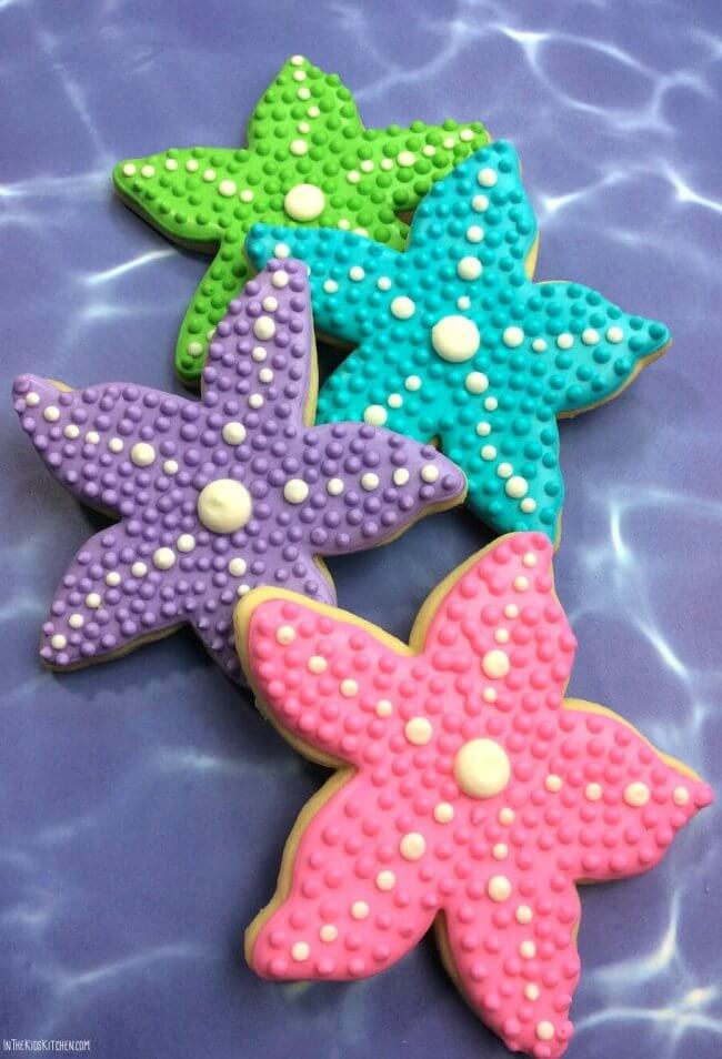 Gorgeous Starfish Cookies are perfect for a Little Mermaid movie night! A festive homemade sugar cookie recipe for a summer pool party or kids birthday!