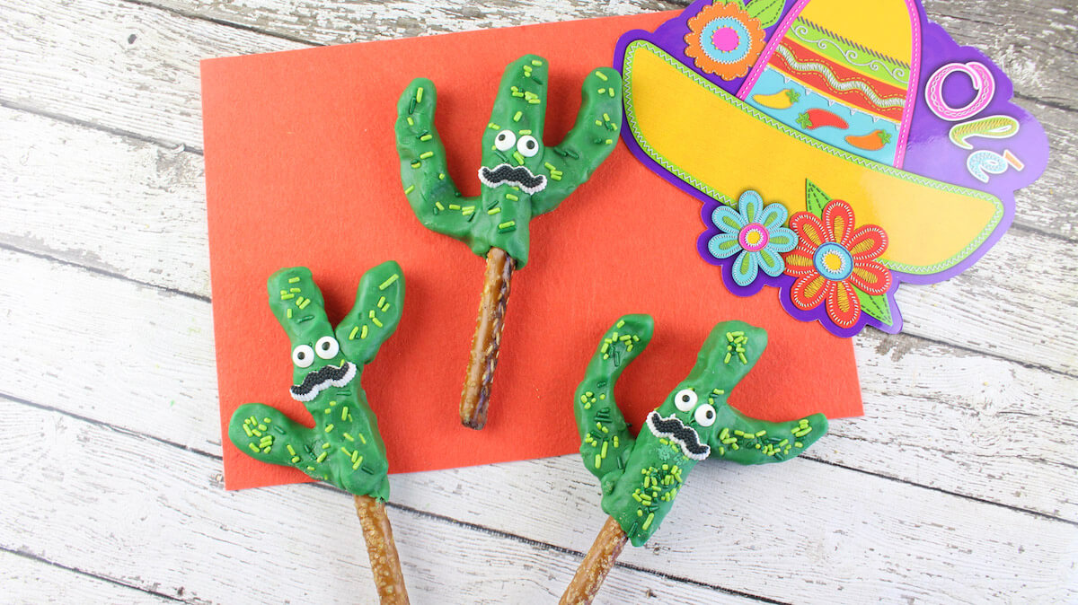 These Cactus Chocolate Covered Pretzel Rods are the cutest Cinco de Mayo or festive party dessert for both kids and adults!