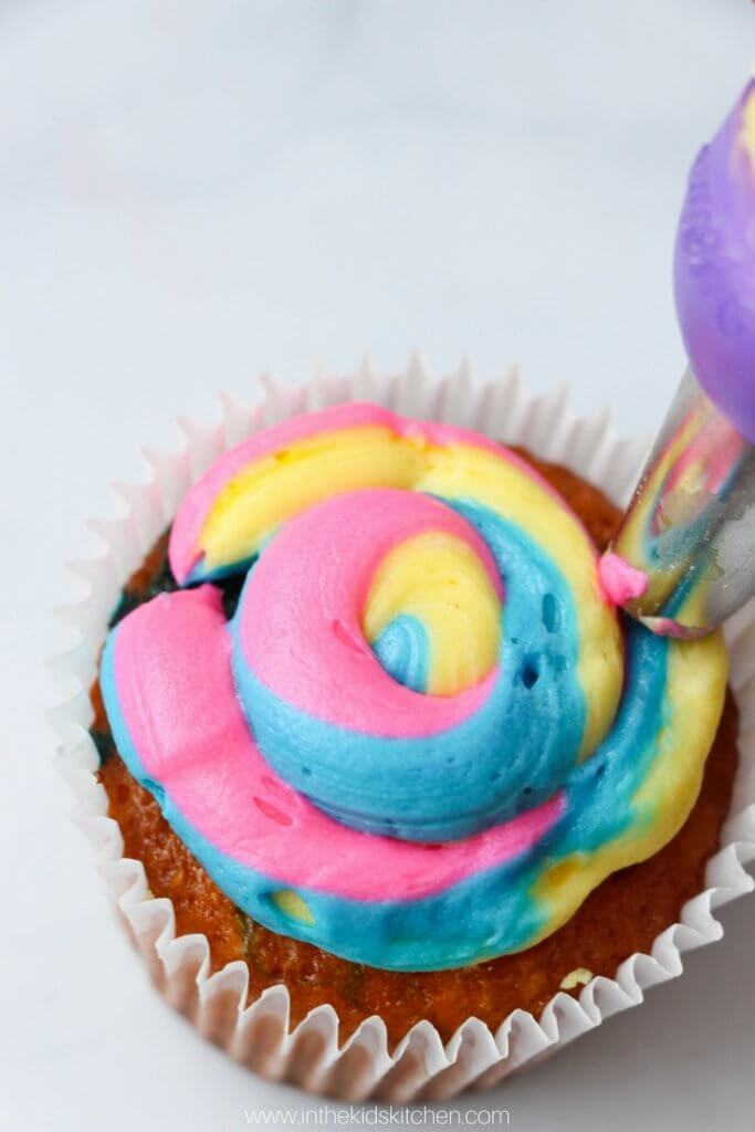 These vibrant Tie Dye Cupcakes are perfect for a summer barbecue or kids birthday party. And you won't believe how easy they are to make!