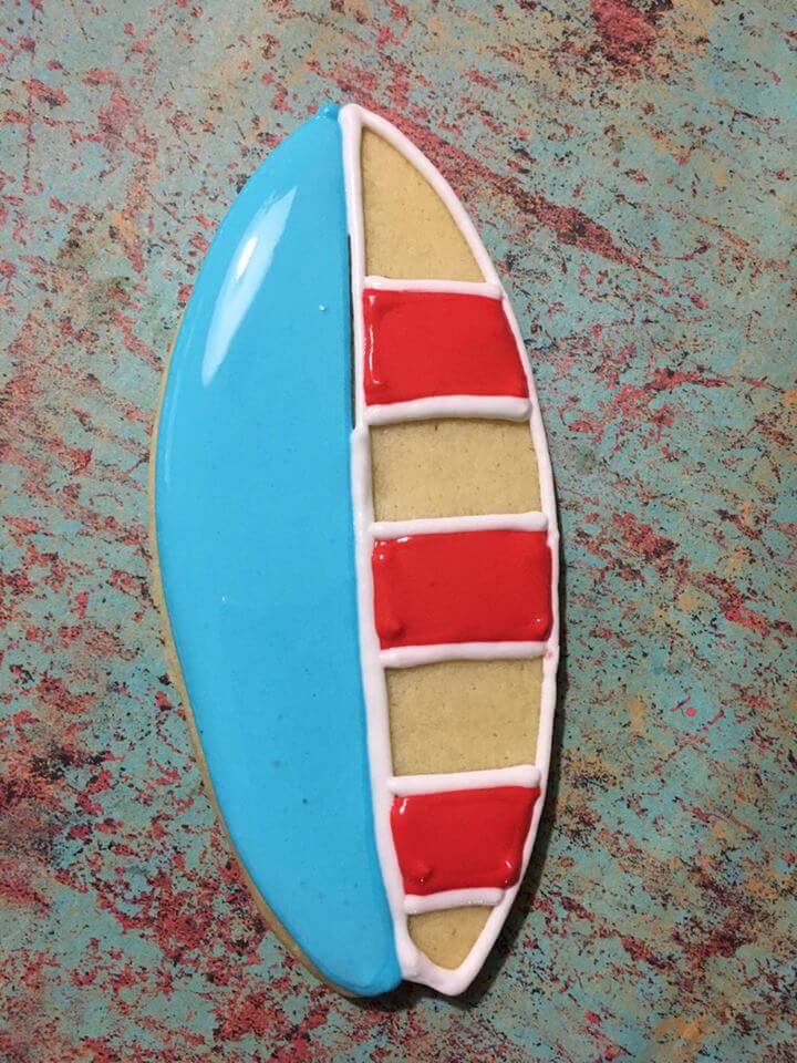 These patriotic surfboard cookies are unique and super-cute treat for your Memorial Day or 4th of July party. Perfect for a summer pool party too!