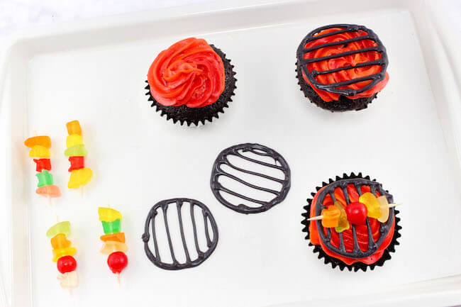 These colorful grill cupcakes are the perfect dessert to make for your next summer barbecue or backyard party! Both kids & grown-ups will love them!