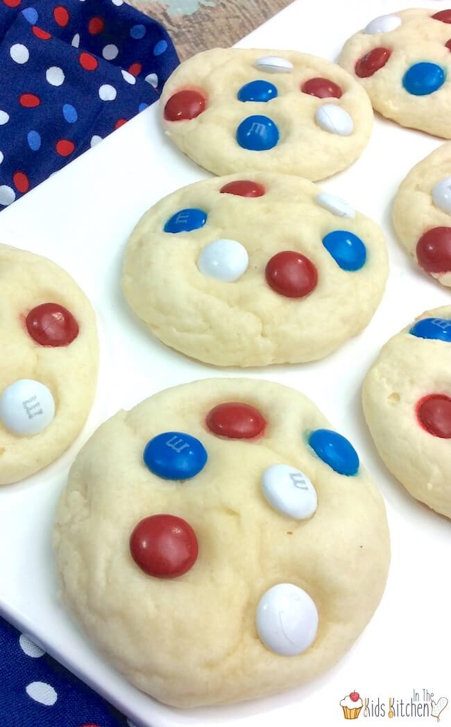 These might look like regular M&M cookies, but look again! These cute and easy 4th of July cookies are actually made with our favorite cake mix cookie recipe - only 4 ingredients total and SO fluffy!