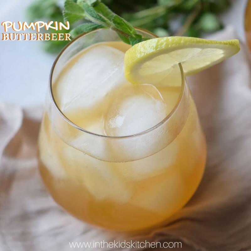 glass of yellow pumpkin flavored butterbeer drink