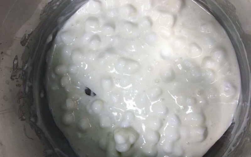 melting marshmallows to make rice krispy treats