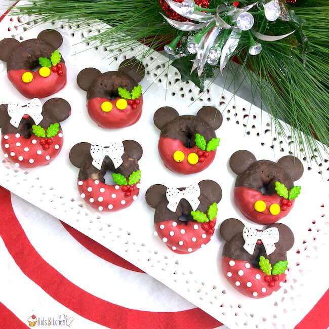 Disney fans will delight in these adorable Mickey & Minnie Christmas donuts! Try something new this year instead of the same old holiday cookies!