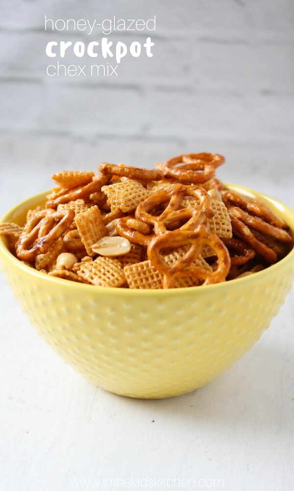 A classic holiday party snack made even easier with this Crockpot Chex Mix recipe! An addicting combination of sweet, salty, & crunchy!