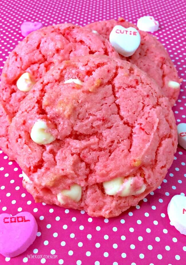 These pillowy soft strawberry cake mix cookies with creamy white chocolate chips are the perfect EASY Valentine's Day dessert! Only 4 ingredients!