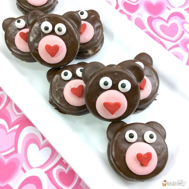 chocolate dipped Oreo cookies decorated to look like teddy bears