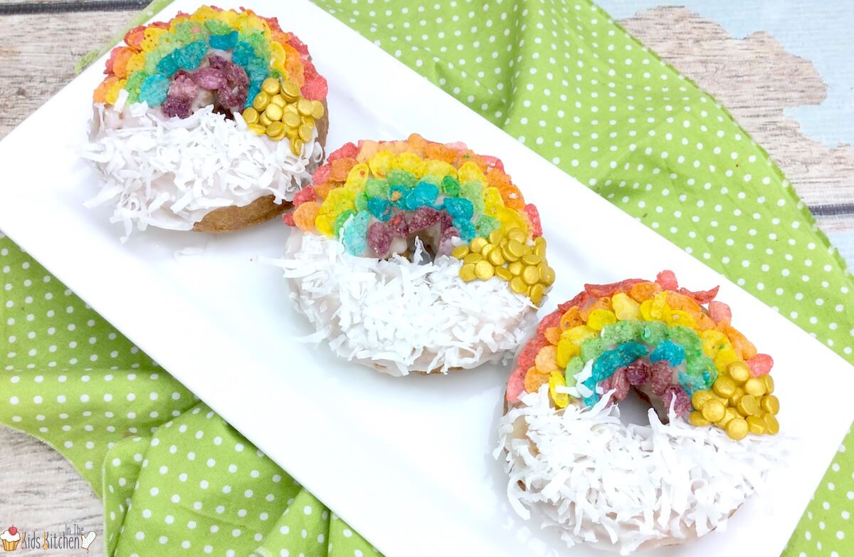 An easy shortcut recipe to make rainbow decorated air fryer donuts. Perfect for St. Patrick's Day or kids birthday parties!