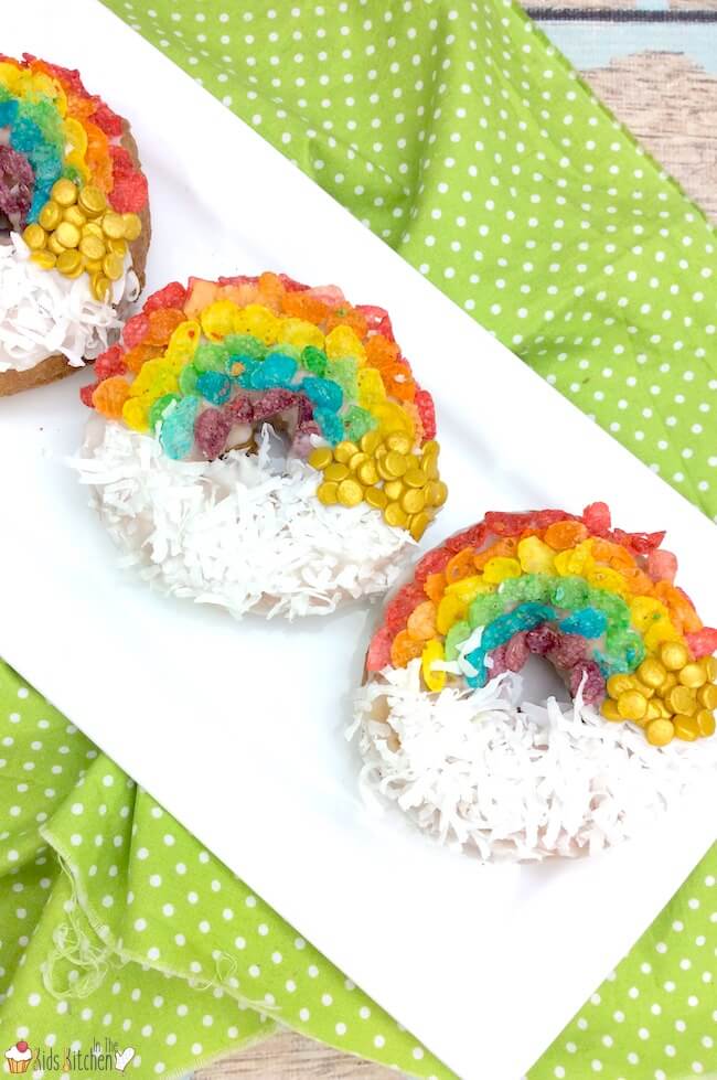 An easy shortcut recipe to make rainbow decorated air fryer donuts. Perfect for St. Patrick's Day or kids birthday parties!