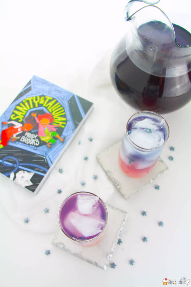 A magical color-changing Galaxy Lemonade recipe inspired by the new book, Sanity & Tallulah by Molly Brooks.