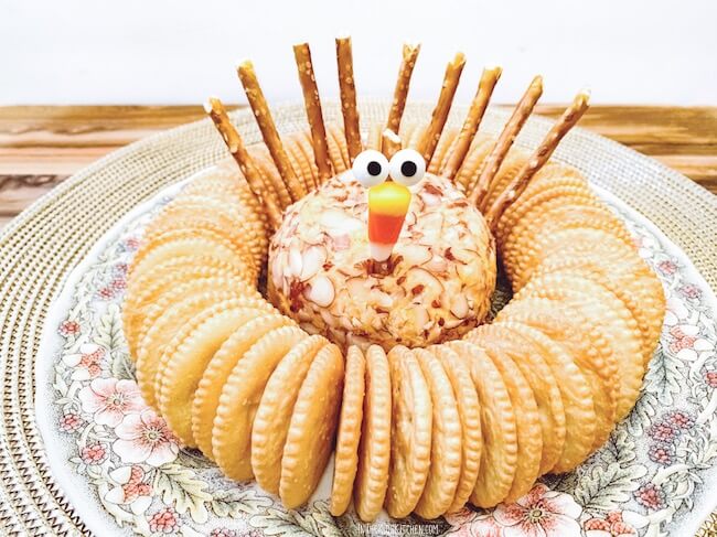 This Turkey Cheese Ball is a super cute Thanksgiving appetizer that takes just minutes to assemble with our shortcut recipe!