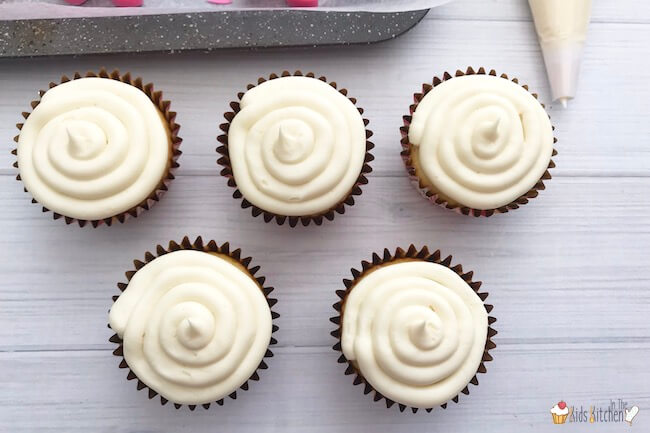 cupcakes with white swirl frosting