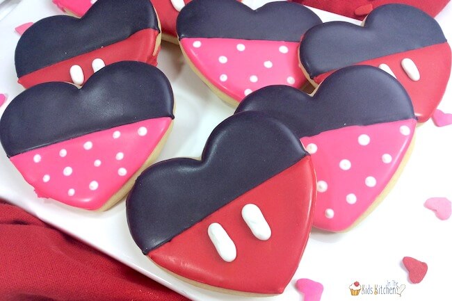 A fun Valentine's Day cookie recipe, these Minnie and Mickey Mouse Heart Cookies will make any Disney fan's day!