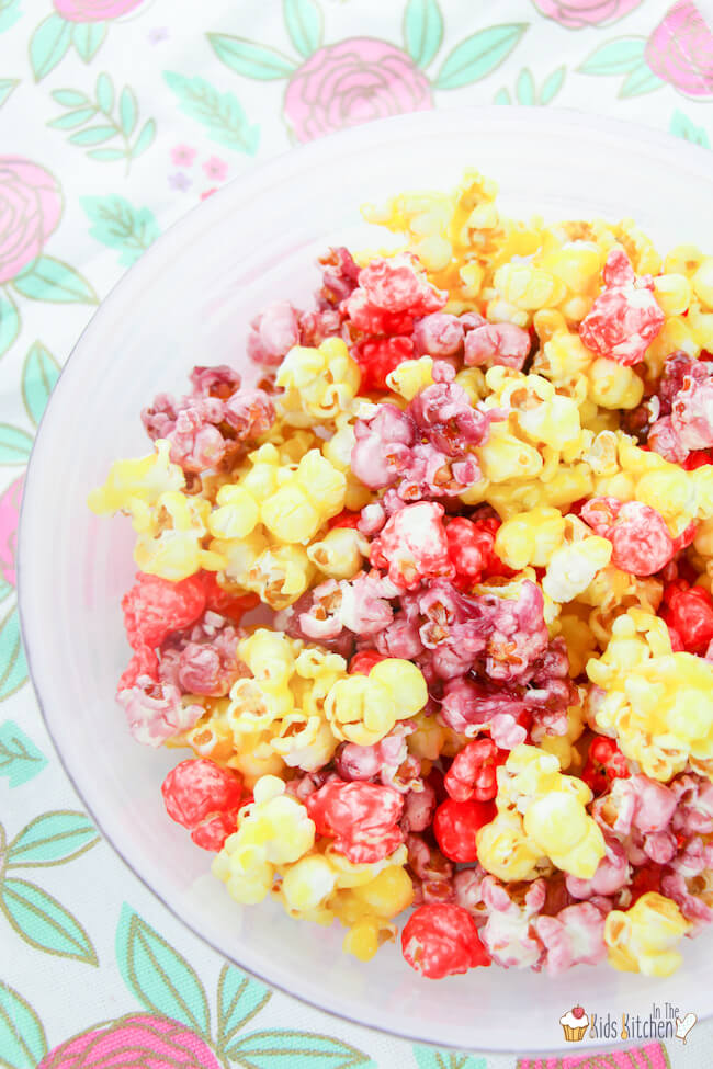 Sweet and colorful — candy coated Jello popcorn is the perfect Spring treat!