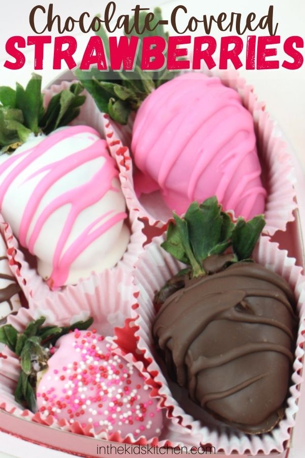 chocolate covered strawberries in a Valentine heart box