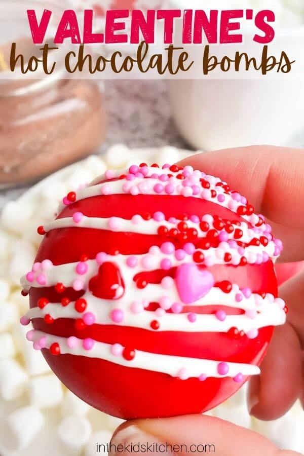 close up of a bright red hot cocoa bomb for Valentine's Day
