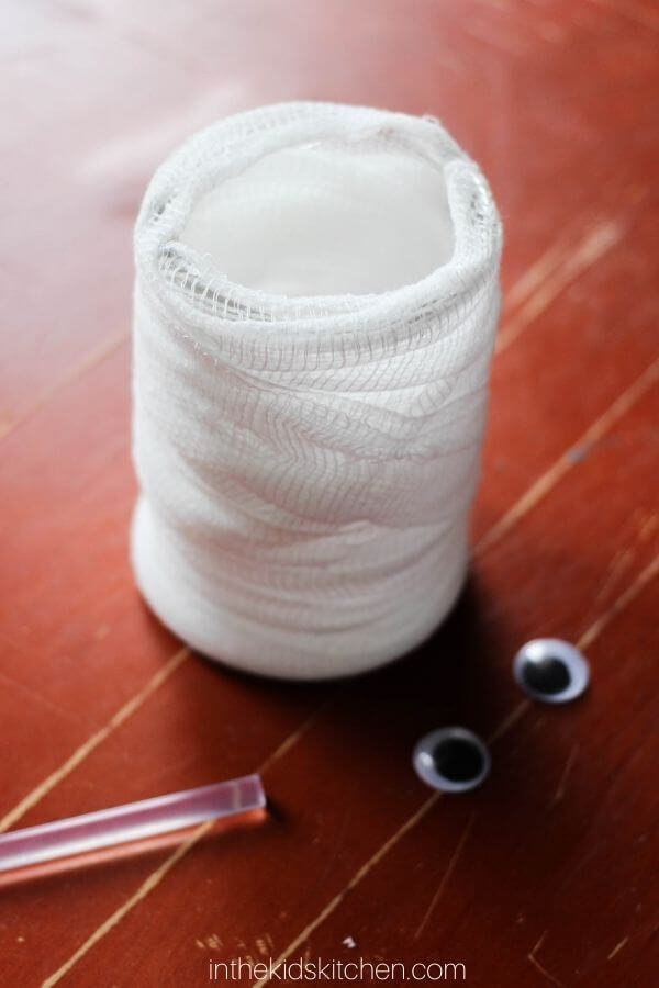 a mason jar wrapped in white gauze