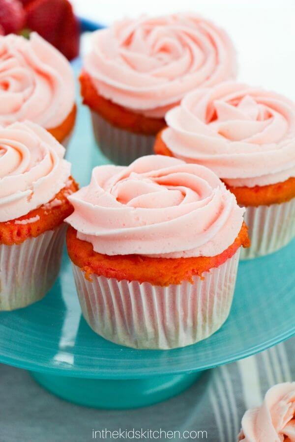 close up of a plate of strawberry cupcakes