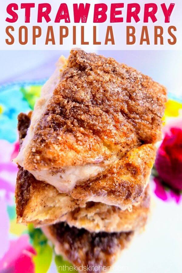 stack of cheesecake bars with text overlay "Strawberry Sopapilla Bars"