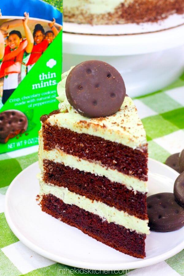 chocolate mint layer cake with a box of Thin Mints in background