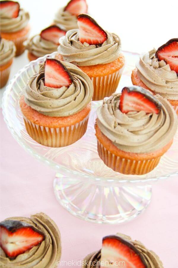 platter of chocolate covered strawberry cupcakes.