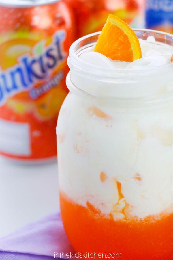 layered orange soda with creamy topping.