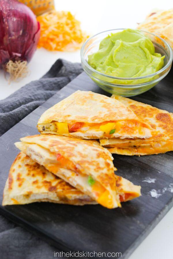 platter of chicken and cheese quesadilla slices