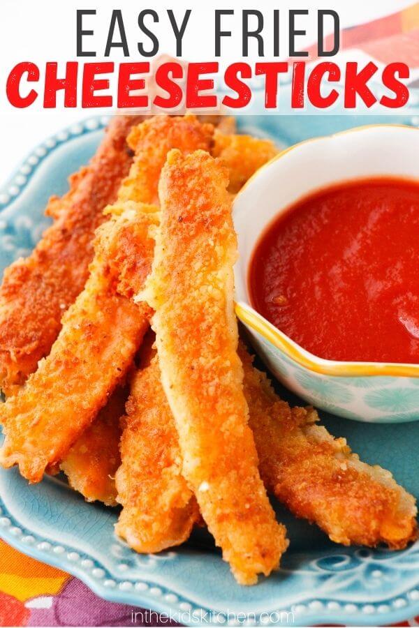 fried cheese sticks on plate with marinara sauce; text overlay "Easy Fried Cheesesticks"