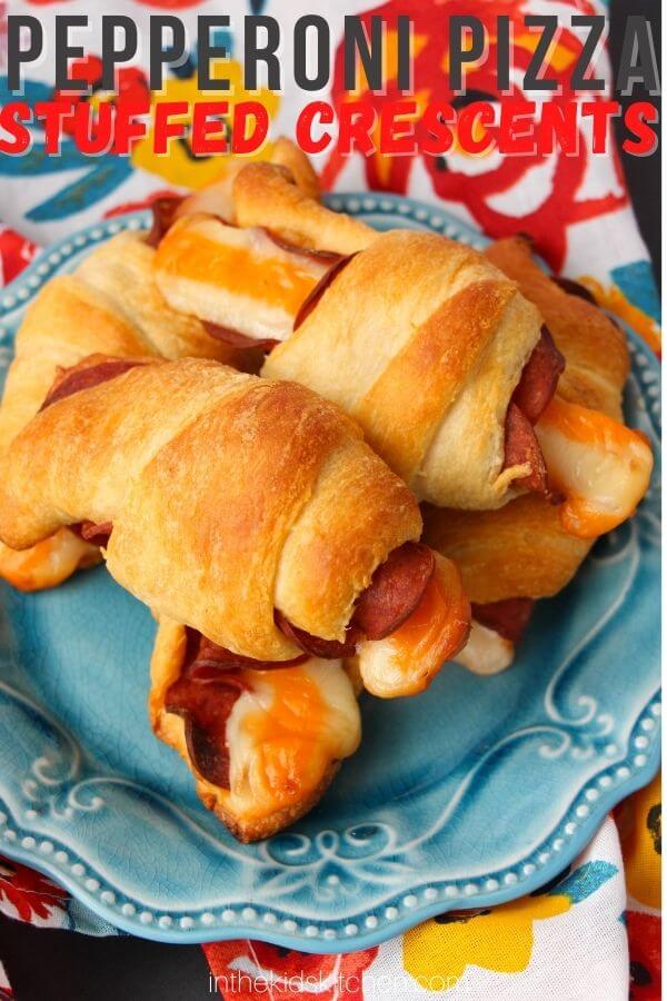 plate of crescent rolls, text overlay "Pepperoni Pizza Stuffed Crescents".