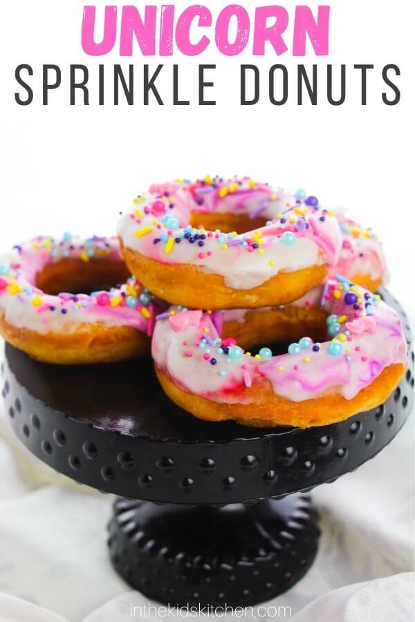 cake stand with homemade donuts; text overlay "Unicorn Sprinkle Donuts".