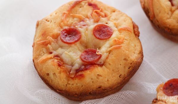 close up of a mini biscuit pizza topped with pepperoni