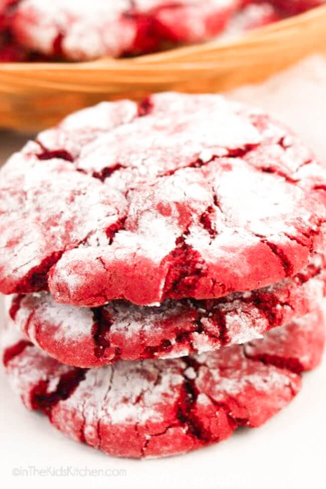 stack of 3 red velvet crinkle cookies.